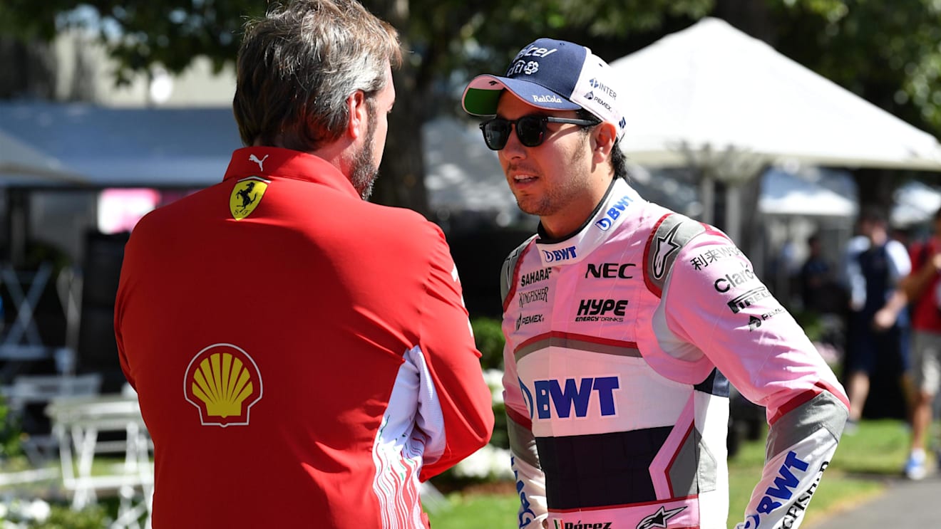 Sergio Perez (MEX) Force India and Gino Rosato (CDN) Ferrari at Formula One World Championship, Rd1, Australian Grand Prix, Preparations, Melbourne, Australia, Thursday 22 March 2018. © Mark Sutton/Sutton Images