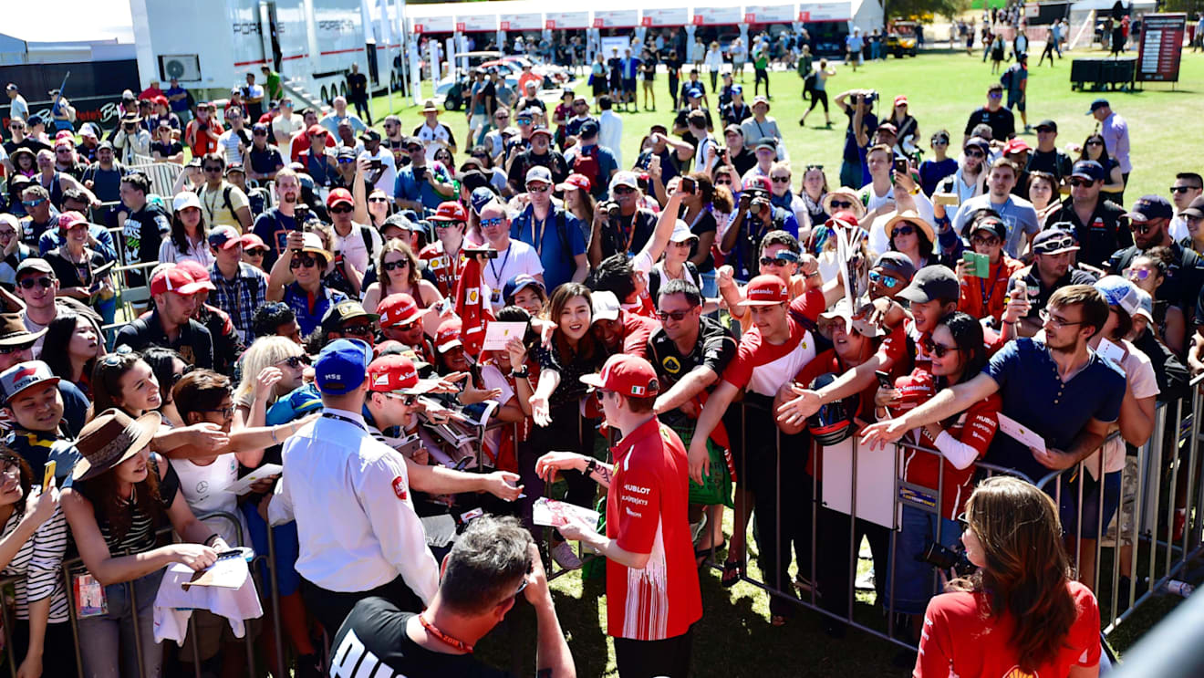 Kimi Raikkonen (FIN) Ferrari signs autographs for the fans at Formula One World Championship, Rd1, Australian Grand Prix, Preparations, Melbourne, Australia, Thursday 22 March 2018. © Jerry Andre/Sutton Images