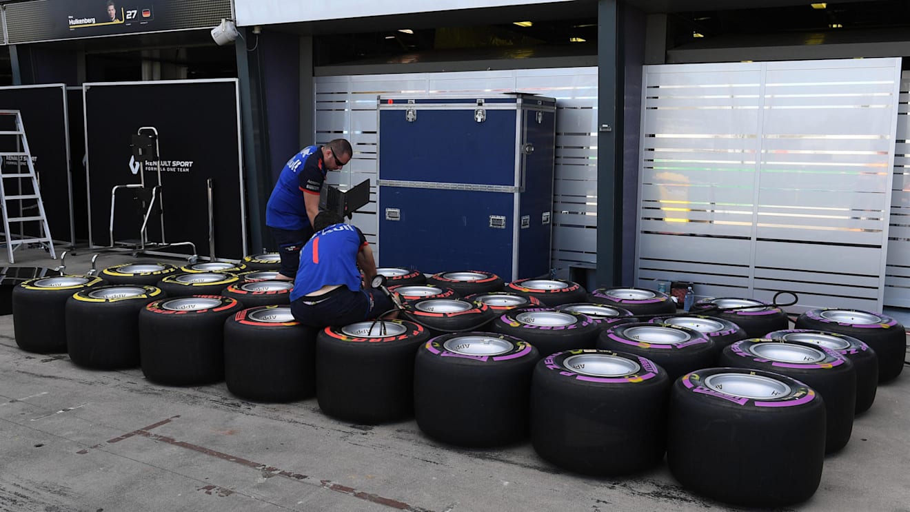 Scuderia Toro Rosso mechanics and Pirelli tyres at Formula One World Championship, Rd1, Australian Grand Prix, Preparations, Melbourne, Australia, Wednesday 21 March 2018. © Mark Sutton/Sutton Images