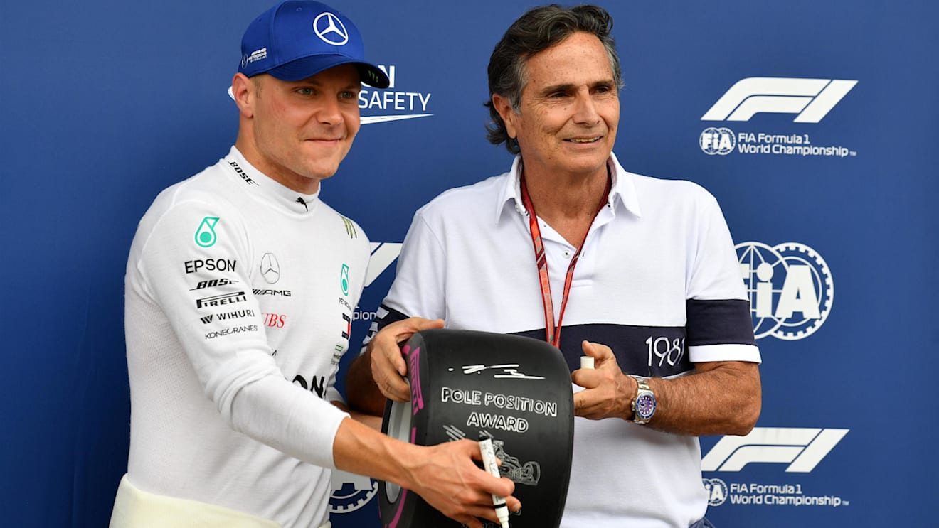 Pole sitter Bottas (FIN) Mercedes-AMG F1 talks receives the Pirelli Pole Position Award from Nelson Piquet (BRA) at Formula One World Championship, Rd9, Austrian Grand Prix, Qualifying, Spielberg, Austria, Saturday 30 June 2018. © Mark Sutton/Sutton Image