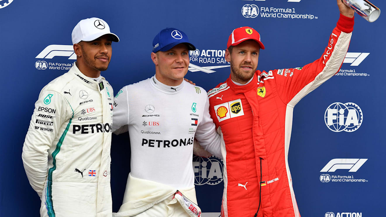 (L to R): Lewis Hamilton (GBR) Mercedes-AMG F1, Valtteri Bottas (FIN) Mercedes-AMG F1 and Sebastian Vettel (GER) Ferrari celebrate in parc ferme at Formula One World Championship, Rd9, Austrian Grand Prix, Qualifying, Spielberg, Austria, Saturday 30 June 2018. © Mark Sutton/Sutton Images
