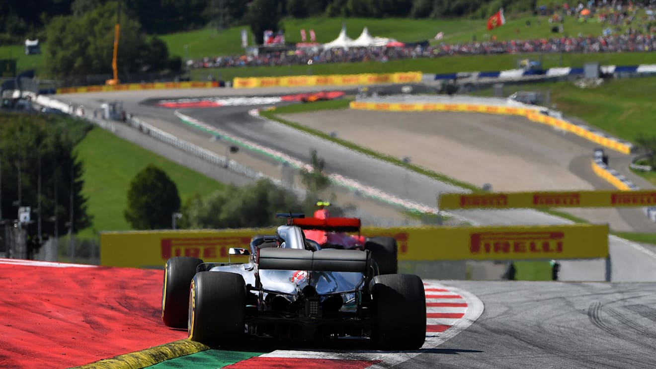 Lewis Hamilton (GBR) Mercedes-AMG F1 W09 EQ Power+ chases Kimi Raikkonen (FIN) Ferrari SF-71H at Formula One World Championship, Rd9, Austrian Grand Prix, Race, Spielberg, Austria, Sunday 1 July 2018. © Mark Sutton/Sutton Images