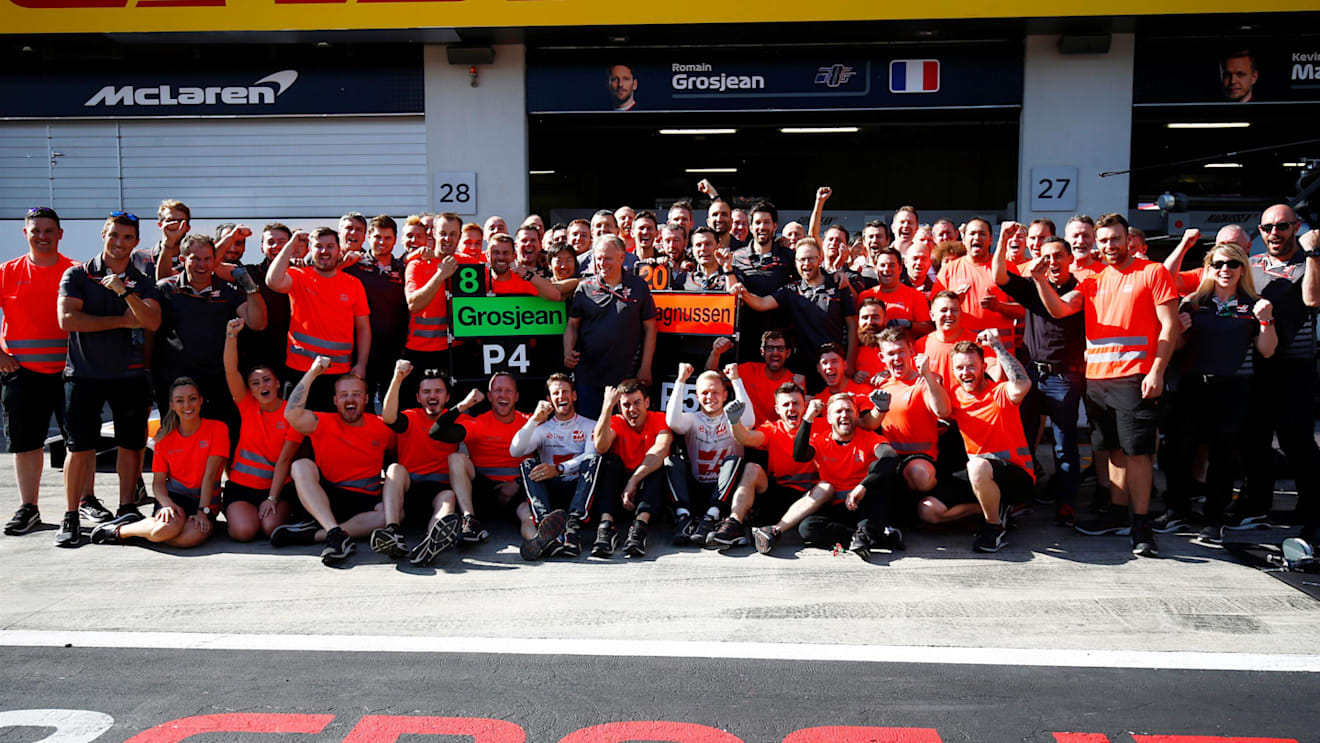 Romain Grosjean (FRA) Haas F1 and Kevin Magnussen (DEN) Haas F1 celebrates fourth and fifth place with the team at Formula One World Championship, Rd9, Austrian Grand Prix, Race, Spielberg, Austria, Sunday 1 July 2018. © Andy Hone/LAT/Sutton Images