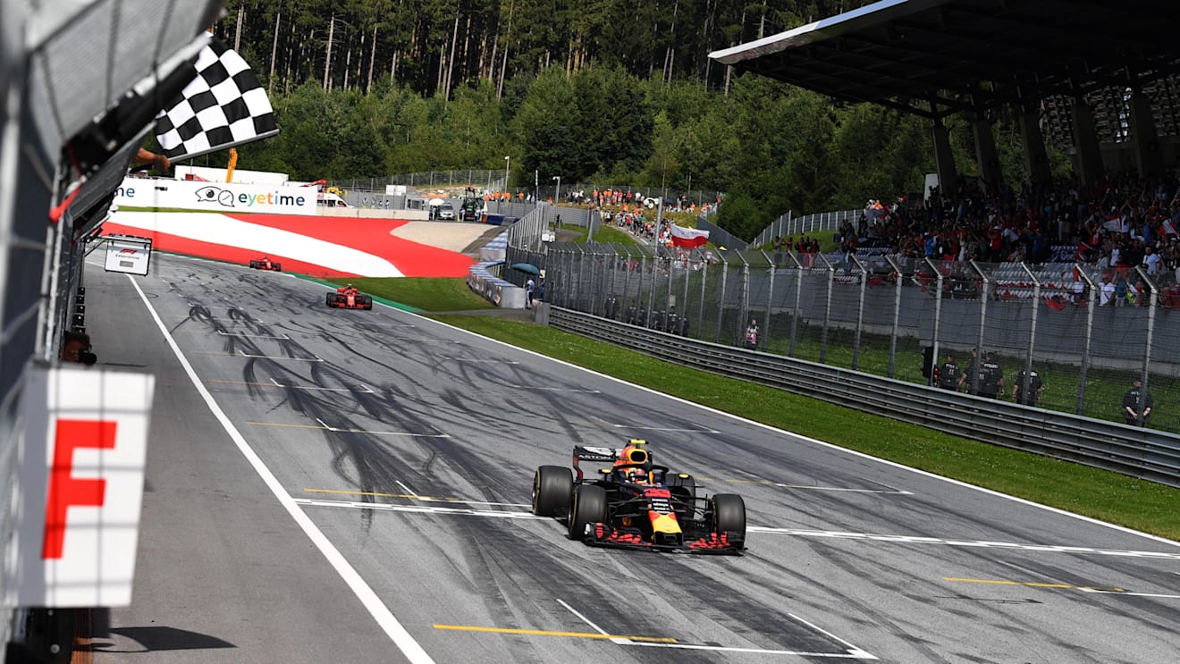 Race winner Max Verstappen (NED) Red Bull Racing RB14 takes the chequered flag at Formula One World Championship, Rd9, Austrian Grand Prix, Race, Spielberg, Austria, Sunday 1 July 2018. © Mark Sutton/Sutton Images