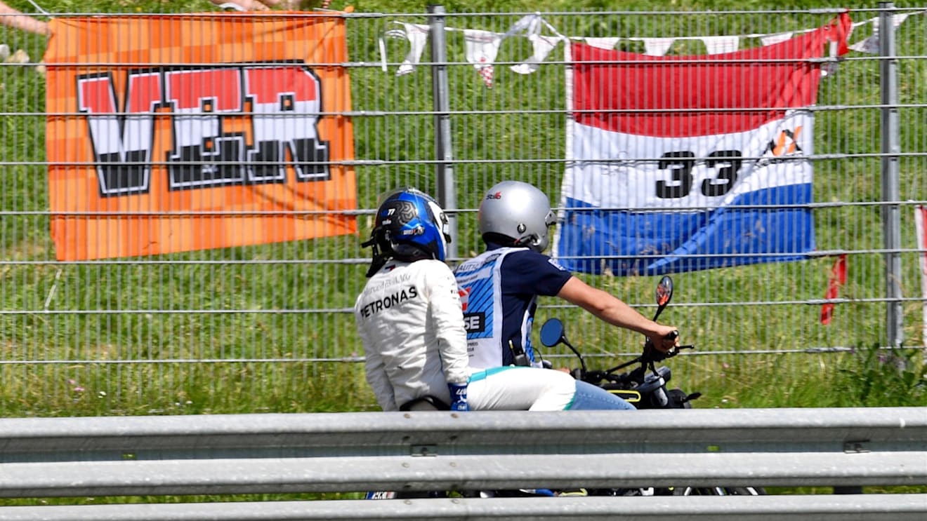 Race retiree Valtteri Bottas (FIN) Mercedes-AMG F1 on a scooter at Formula One World Championship, Rd9, Austrian Grand Prix, Race, Spielberg, Austria, Sunday 1 July 2018. © Jerry Andre/Sutton Images