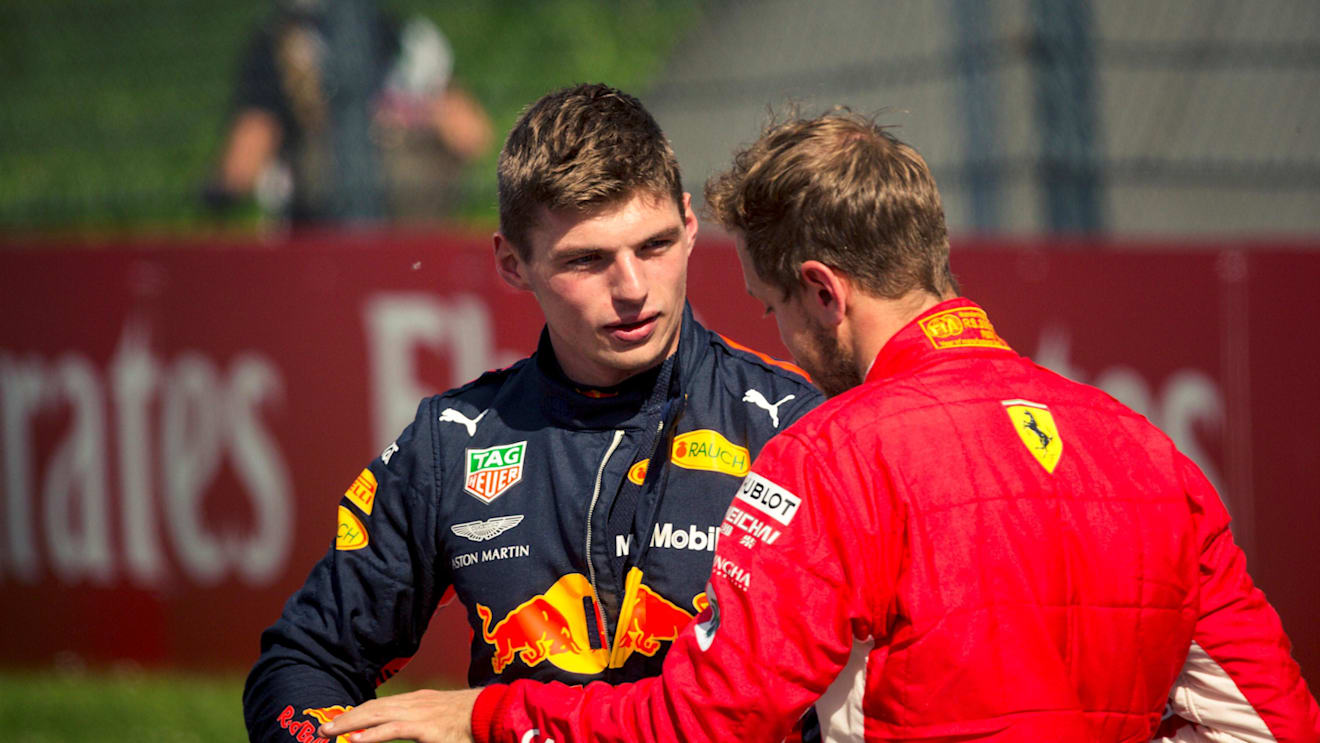 Max Verstappen (NED) Red Bull Racing and Sebastian Vettel (GER) Ferrari in parc ferme at Formula One World Championship, Rd9, Austrian Grand Prix, Race, Spielberg, Austria, Sunday 1 July 2018. © Manuel Goria/Sutton Images