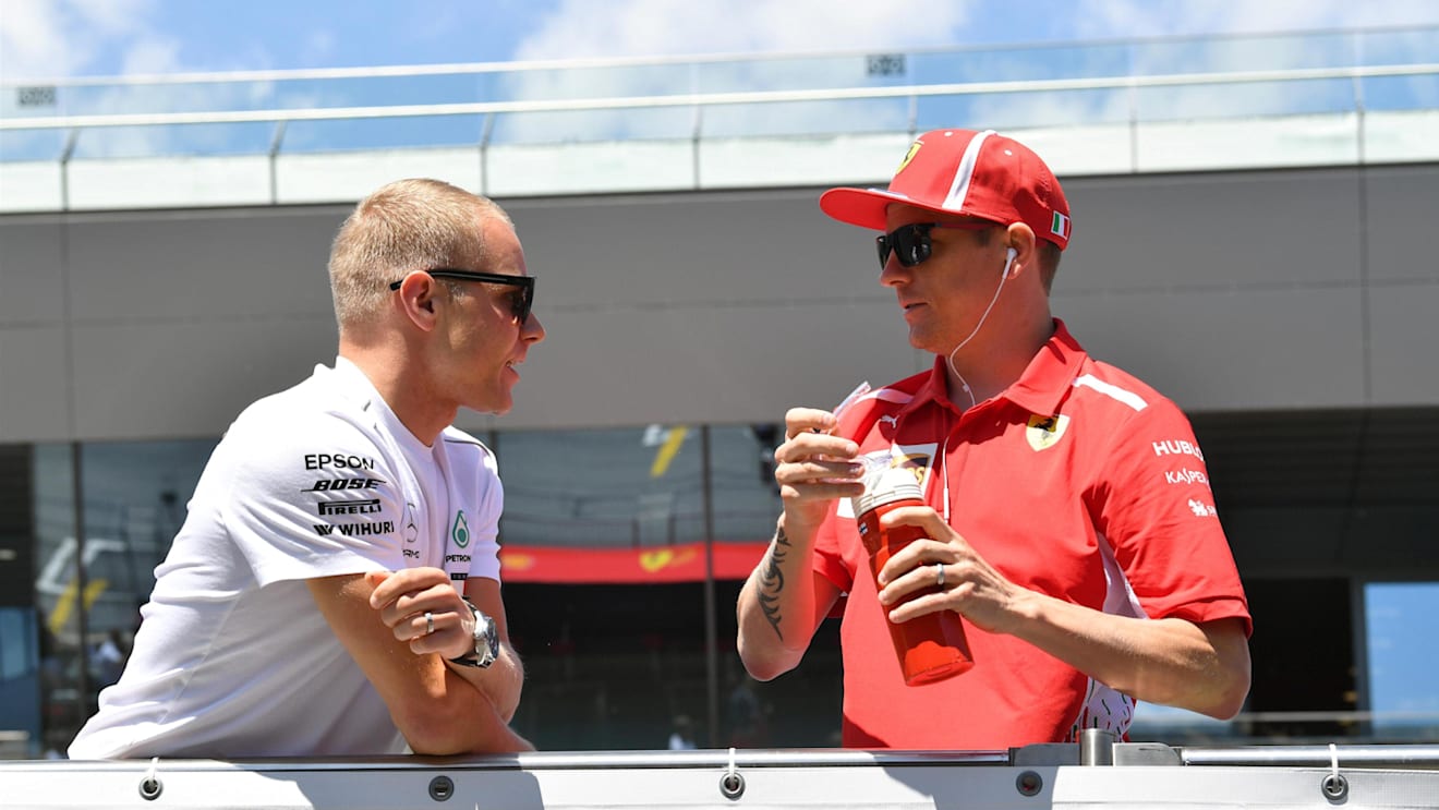 Valtteri Bottas (FIN) Mercedes-AMG F1 and Kimi Raikkonen (FIN) Ferrari on the drivers parade at Formula One World Championship, Rd9, Austrian Grand Prix, Race, Spielberg, Austria, Sunday 1 July 2018. © Mark Sutton/Sutton Images