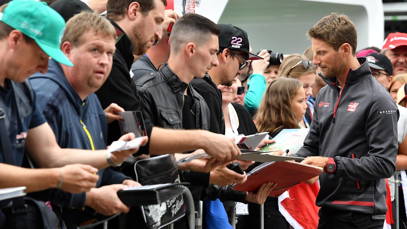 Romain Grosjean (FRA) Haas F1 signs autographs for the fans at Formula One World Championship, Rd9, Austrian Grand Prix, Preparations, Spielberg, Austria, Thursday 28 June 2018. © Jerry Andre/Sutton Images