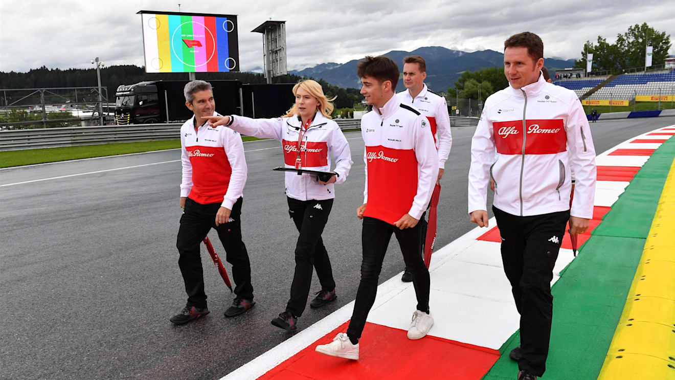 Charles Leclerc (MON) Alfa Romeo Sauber F1 Team walks the track with Xevi Pujolar (ESP) Alfa Romeo Sauber F1 Team Head of Track Engineering and Ruth Buscombe (GBR) Alfa Romeo Sauber F1 Team Race Strategist at Formula One World Championship, Rd9, Austrian Grand Prix, Preparations, Spielberg, Austria, Thursday 28 June 2018. © Mark Sutton/Sutton Images