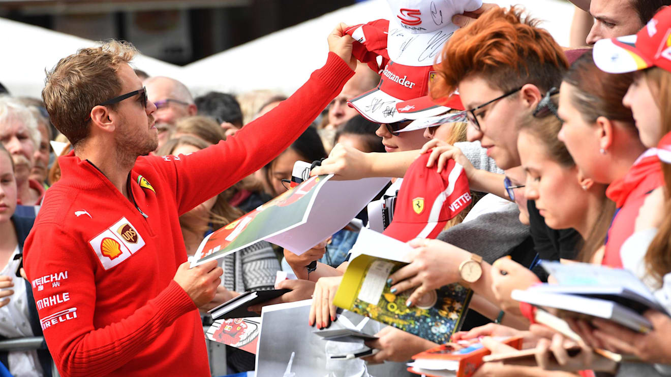 Sebastian Vettel (GER) Ferrari signs autographs for the fans at Formula One World Championship, Rd9, Austrian Grand Prix, Preparations, Spielberg, Austria, Thursday 28 June 2018. © Jerry Andre/Sutton Images