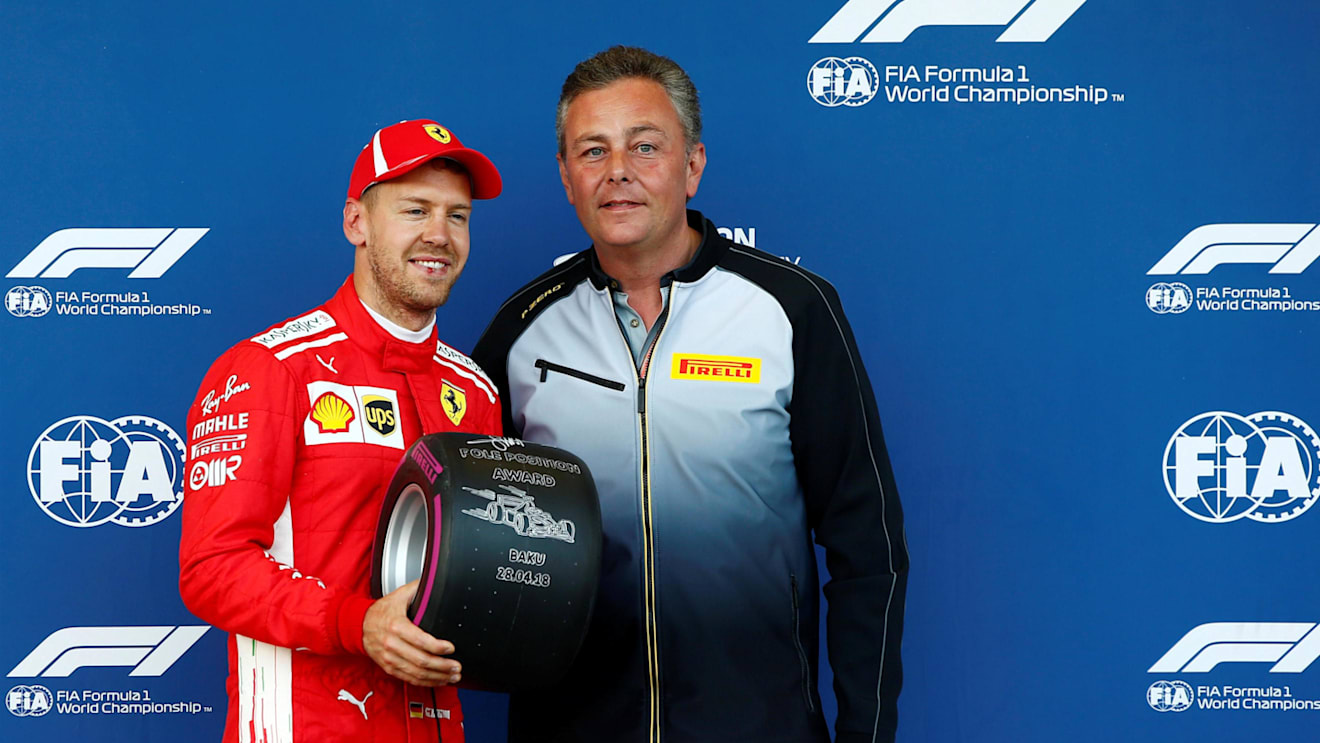 Sebastian Vettel (GER) Ferrari receives the Pole Position Award from Mario Isola (ITA) Pirelli Sporting Director at Formula One World Championship, Rd4, Azerbaijan Grand Prix, Qualifying, Baku City Circuit, Baku, Azerbaijan, Saturday 28 April 2018. © Andy Hone/LAT/Sutton Images