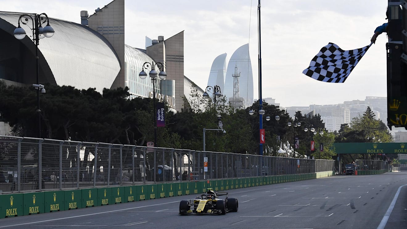 Carlos Sainz jr (ESP) Renault Sport F1 Team RS18 takes the chequered flag at the end of Qualifying at Formula One World Championship, Rd4, Azerbaijan Grand Prix, Qualifying, Baku City Circuit, Baku, Azerbaijan, Saturday 28 April 2018. © Mark Sutton/Sutton Images