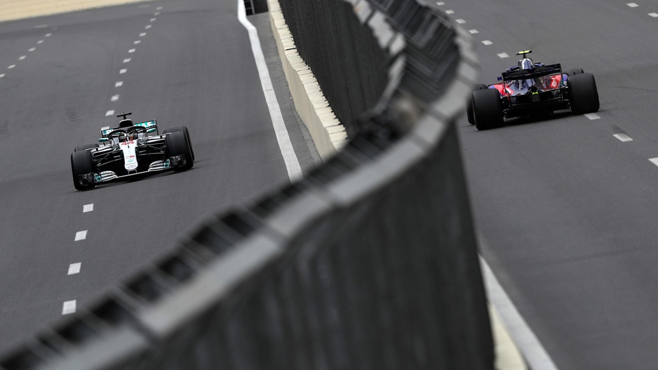 Lewis Hamilton (GBR) Mercedes-AMG F1 W09 EQ Power+ and Pierre Gasly (FRA) Scuderia Toro Rosso STR13 at Formula One World Championship, Rd4, Azerbaijan Grand Prix, Qualifying, Baku City Circuit, Baku, Azerbaijan, Saturday 28 April 2018. © James Gasperotti/Sutton Images