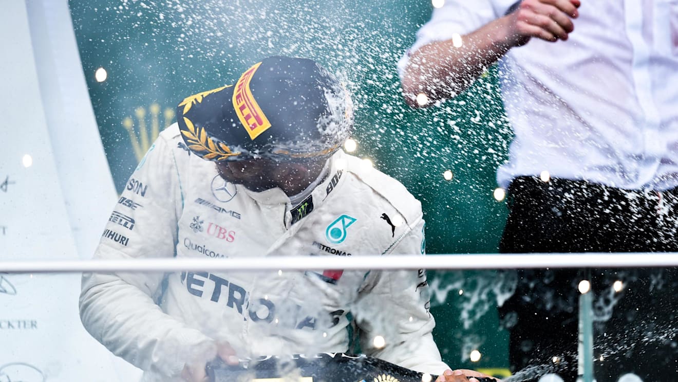 Race winner Lewis Hamilton (GBR) Mercedes-AMG F1 celebrates on the podium with the champagne at Formula One World Championship, Rd4, Azerbaijan Grand Prix, Race, Baku City Circuit, Baku, Azerbaijan, Sunday 29 April 2018. © Simon Galloway/Sutton Images