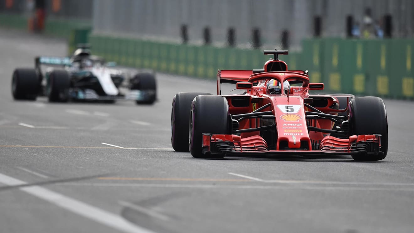 Sebastian Vettel (GER) Ferrari SF-71H leads Lewis Hamilton (GBR) Mercedes-AMG F1 W09 EQ Power+ at Formula One World Championship, Rd4, Azerbaijan Grand Prix, Race, Baku City Circuit, Baku, Azerbaijan, Sunday 29 April 2018. © Simon Galloway/Sutton Images