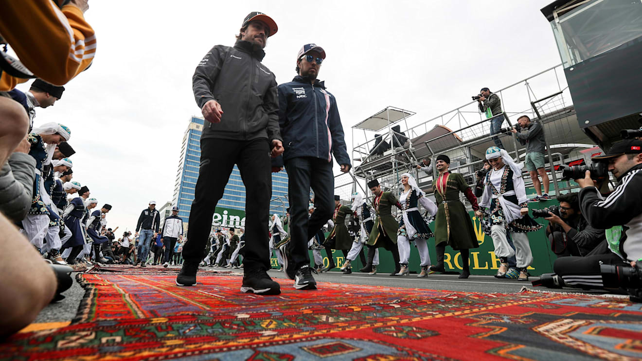 Fernando Alonso (ESP) McLaren and Sergio Perez (MEX) Force India on the drivers parade at Formula One World Championship, Rd4, Azerbaijan Grand Prix, Race, Baku City Circuit, Baku, Azerbaijan, Sunday 29 April 2018. © James Gasperotti/Sutton Images