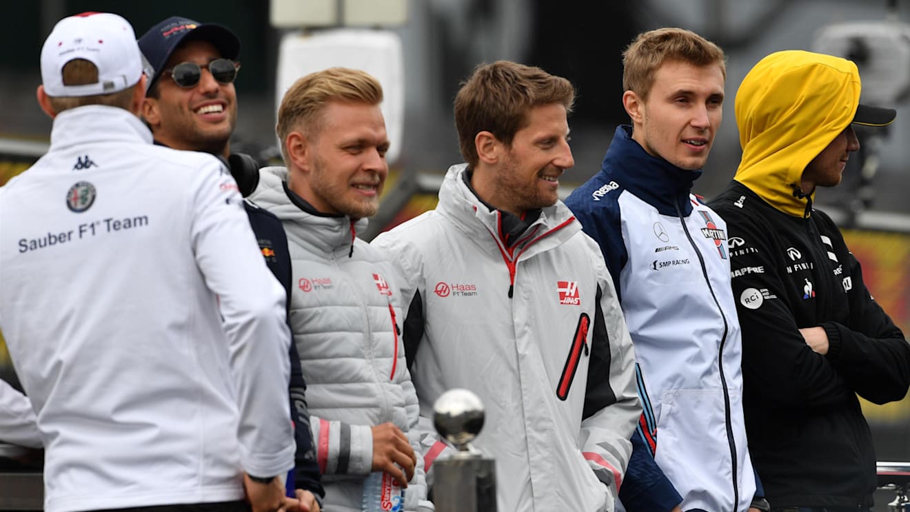 Kevin Magnussen (DEN) Haas F1, Romain Grosjean (FRA) Haas F1 and Sergey Sirotkin (RUS) Williams on the drivers parade at Formula One World Championship, Rd4, Azerbaijan Grand Prix, Race, Baku City Circuit, Baku, Azerbaijan, Sunday 29 April 2018. © Jerry A