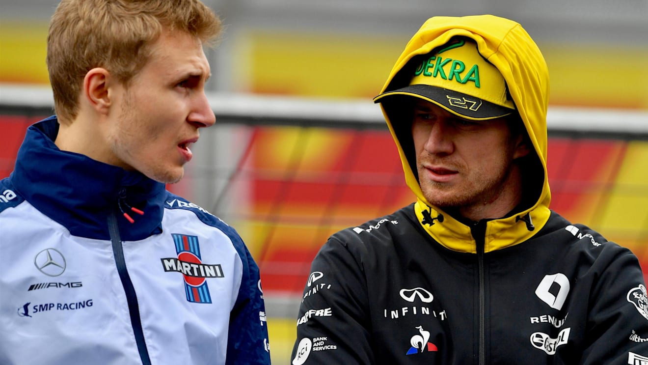 Sergey Sirotkin (RUS) Williams and Nico Hulkenberg (GER) Renault Sport F1 Team on the drivers parade at Formula One World Championship, Rd4, Azerbaijan Grand Prix, Race, Baku City Circuit, Baku, Azerbaijan, Sunday 29 April 2018. © Jerry Andre/Sutton Image