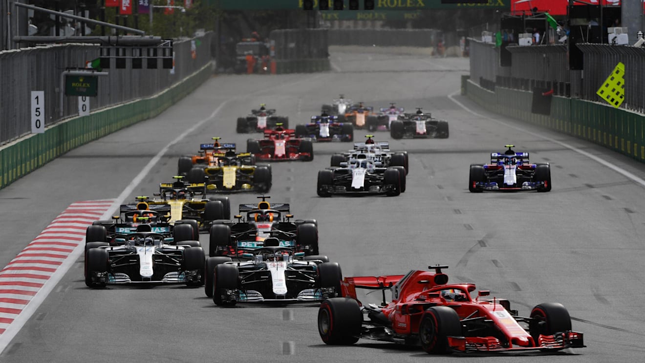 Sebastian Vettel (GER) Ferrari SF-71H leads Lewis Hamilton (GBR) Mercedes-AMG F1 W09 EQ Power+ at Formula One World Championship, Rd4, Azerbaijan Grand Prix, Race, Baku City Circuit, Baku, Azerbaijan, Sunday 29 April 2018. © Mark Sutton/Sutton Images