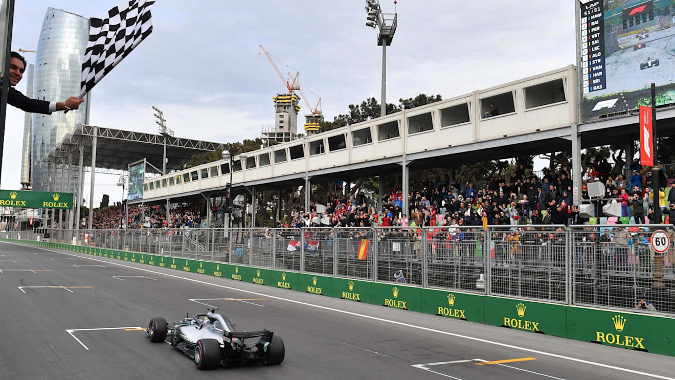 Race winner Lewis Hamilton (GBR) Mercedes-AMG F1 W09 EQ Power+ takes the chequered flag at Formula One World Championship, Rd4, Azerbaijan Grand Prix, Race, Baku City Circuit, Baku, Azerbaijan, Sunday 29 April 2018. © Mark Sutton/Sutton Images
