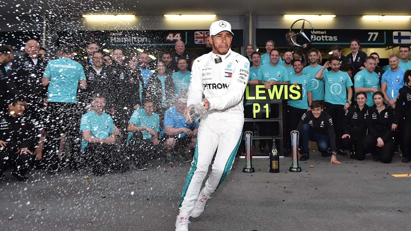 Race winner Lewis Hamilton (GBR) Mercedes-AMG F1 celebrates with the team and the champagne at Formula One World Championship, Rd4, Azerbaijan Grand Prix, Race, Baku City Circuit, Baku, Azerbaijan, Sunday 29 April 2018. © Simon Galloway/Sutton Images