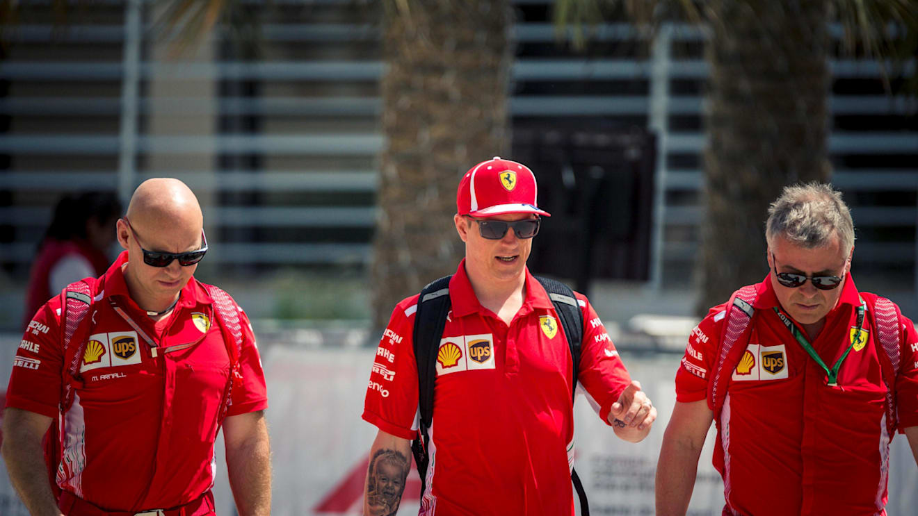 Kimi Raikkonen (FIN) Ferrari and trainer Mark Arnall (GBR) at Formula One World Championship, Rd2, Bahrain Grand Prix, Qualifying, Bahrain International Circuit, Sakhir, Bahrain, Saturday 7 April 2018. © Manuel Goria/Sutton Images