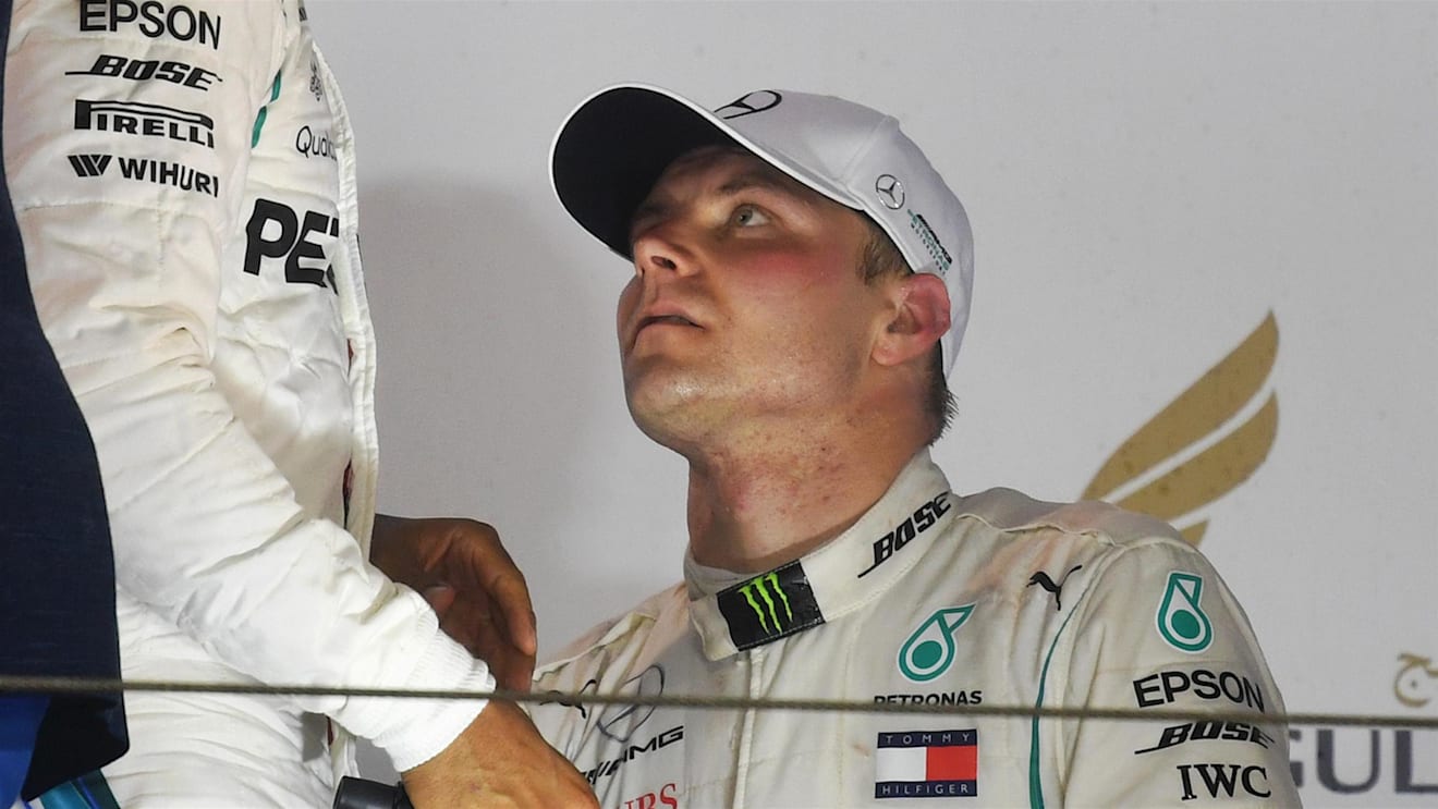 Lewis Hamilton (GBR) Mercedes-AMG F1 and Valtteri Bottas (FIN) Mercedes-AMG F1 on the podium at Formula One World Championship, Rd2, Bahrain Grand Prix, Race, Bahrain International Circuit, Sakhir, Bahrain, Sunday 8 April 2018. © Mark Sutton/Sutton Images