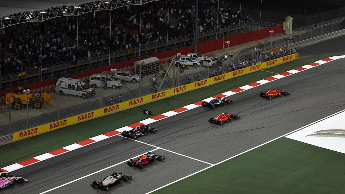 Sebastian Vettel (GER) Ferrari SF-71H leads at the start of the race at Formula One World Championship, Rd2, Bahrain Grand Prix, Race, Bahrain International Circuit, Sakhir, Bahrain, Sunday 8 April 2018. © Mark Sutton/Sutton Images