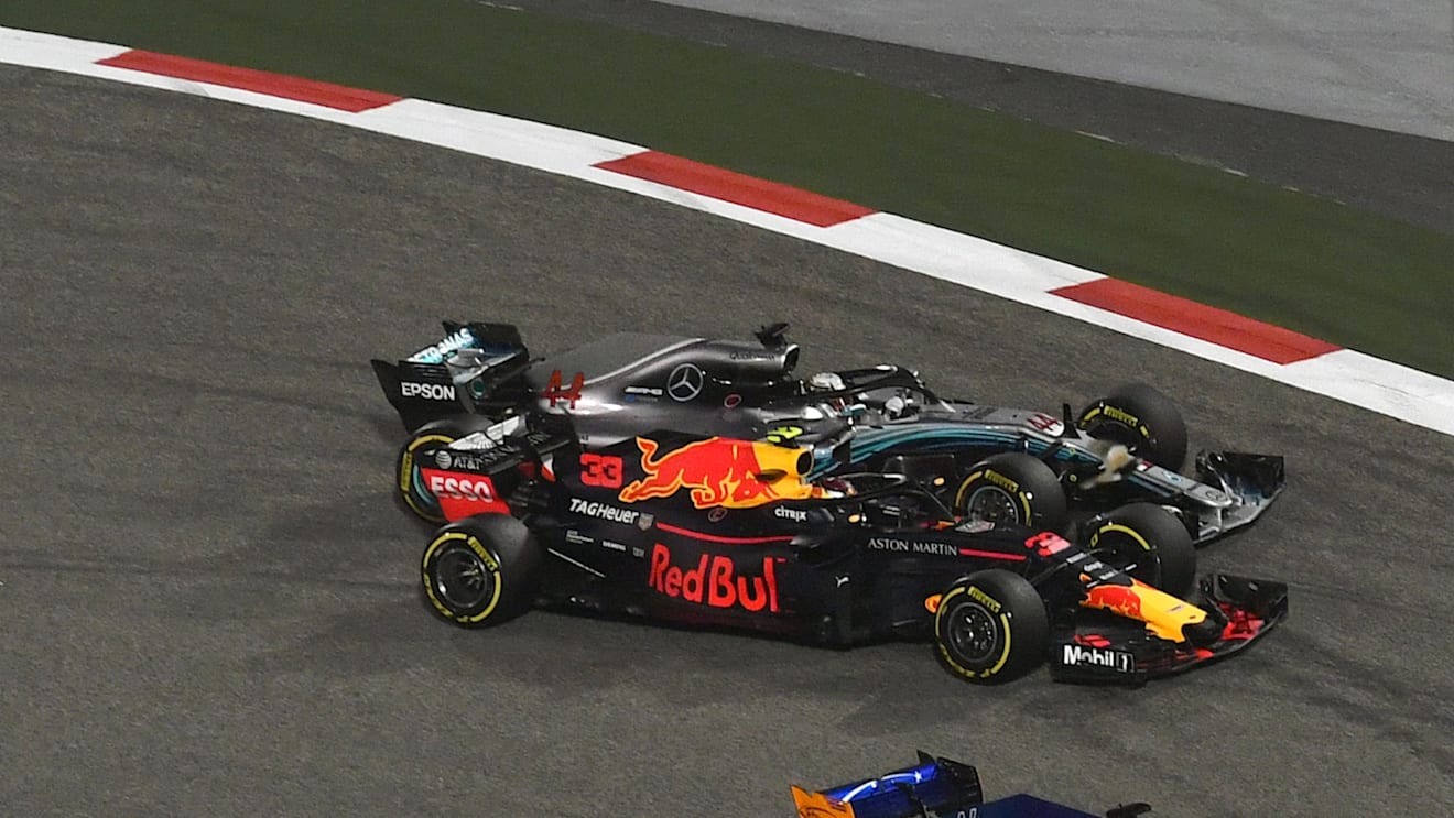Lewis Hamilton (GBR) Mercedes-AMG F1 W09 EQ Power+ and Max Verstappen (NED) Red Bull Racing RB14 battle at Formula One World Championship, Rd2, Bahrain Grand Prix, Race, Bahrain International Circuit, Sakhir, Bahrain, Sunday 8 April 2018. © Mark Sutton/Su