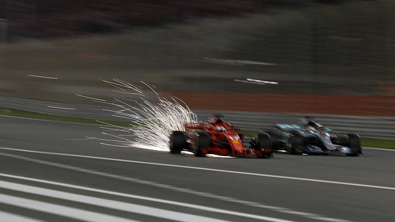 Sebastian Vettel (GER) Ferrari SF-71H and Lewis Hamilton (GBR) Mercedes-AMG F1 W09 EQ Power+ battle at Formula One World Championship, Rd2, Bahrain Grand Prix, Race, Bahrain International Circuit, Sakhir, Bahrain, Sunday 8 April 2018. © Manuel Goria/Sutton Images