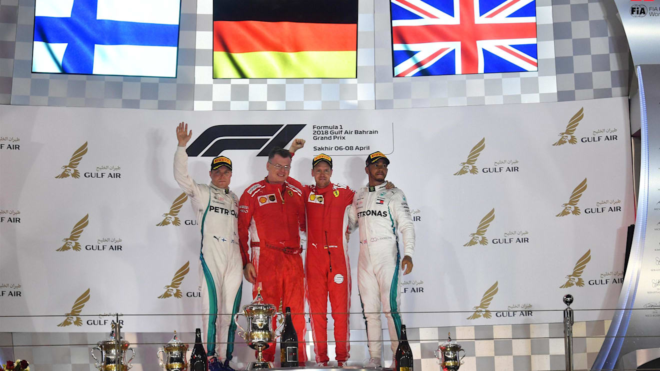Valtteri Bottas (FIN) Mercedes-AMG F1, Sebastian Vettel (GER) Ferrari and Lewis Hamilton (GBR) Mercedes-AMG F1 celebrate on the podium at Formula One World Championship, Rd2, Bahrain Grand Prix, Race, Bahrain International Circuit, Sakhir, Bahrain, Sunday 8 April 2018. © Mark Sutton/Sutton Images