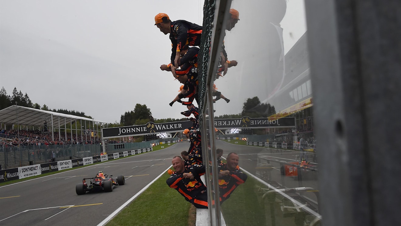 Max Verstappen, Red Bull Racing RB14 finshes crosses the line with his mechanics celebrating at Formula One World Championship, Rd13, Belgian Grand Prix, Race, Spa Francorchamps, Belgium, Sunday 26 August 2018. © Jose Rubio/Sutton Images