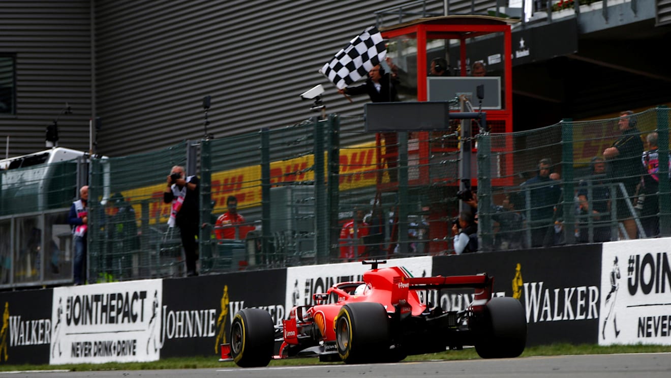Race winner Sebastian Vettel, Ferrari SF71H takes the chequered flag at Formula One World Championship, Rd13, Belgian Grand Prix, Race, Spa Francorchamps, Belgium, Sunday 26 August 2018. © Andy Hone/LAT/Sutton Images