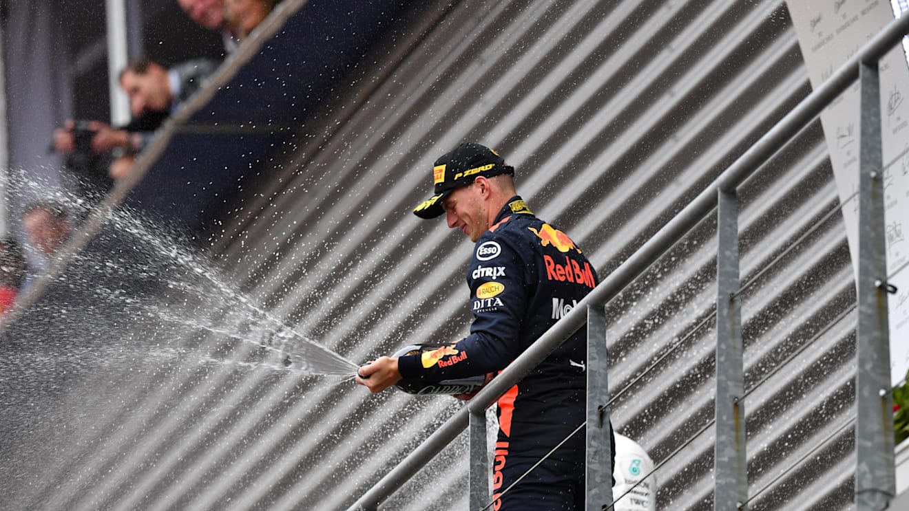 mmvp celebrates on the podium with the champagne at Formula One World Championship, Rd13, Belgian Grand Prix, Race, Spa Francorchamps, Belgium, Sunday 26 August 2018. © Jerry Andre/Sutton Images