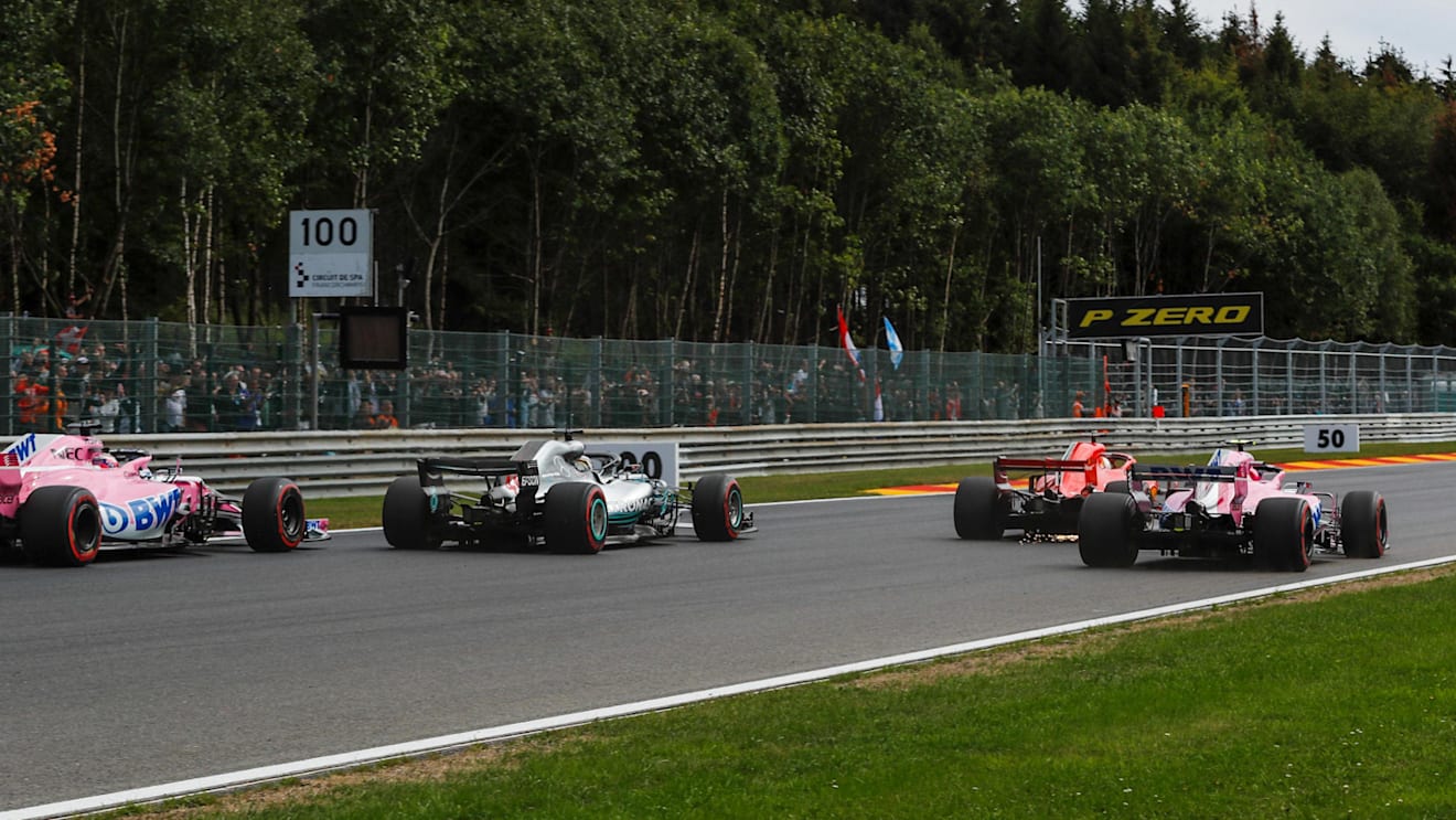 Sergio Perez, Racing Point Force India VJM11, Lewis Hamilton, Mercedes AMG F1 W09, Sebastian Vettel, Ferrari SF71H and Esteban Ocon, Racing Point Force India VJM11 battle on lap one at Formula One World Championship, Rd13, Belgian Grand Prix, Race, Spa Francorchamps, Belgium, Sunday 26 August 2018. © Manuel Goria/Sutton Images