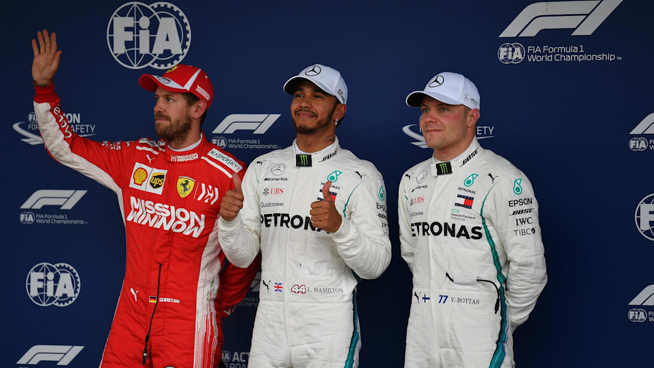 (L to R): Sebastian Vettel, Ferrari, Lewis Hamilton, Mercedes AMG F1 and Valtteri Bottas, Mercedes AMG F1 celebrate in Parc Ferme at Formula One World Championship, Rd20, Brazilian Grand Prix, Qualifying, Interlagos, Sao Paulo, Brazil, Saturday 10 November 2018.