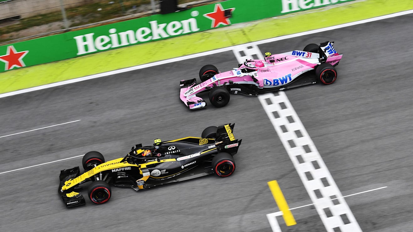 Esteban Ocon, Racing Point Force India VJM11 and Carlos Sainz, Renault Sport F1 Team R.S. 18 battle at Formula One World Championship, Rd20, Brazilian Grand Prix, Race, Interlagos, Sao Paulo, Brazil, Sunday 11 November 2018.