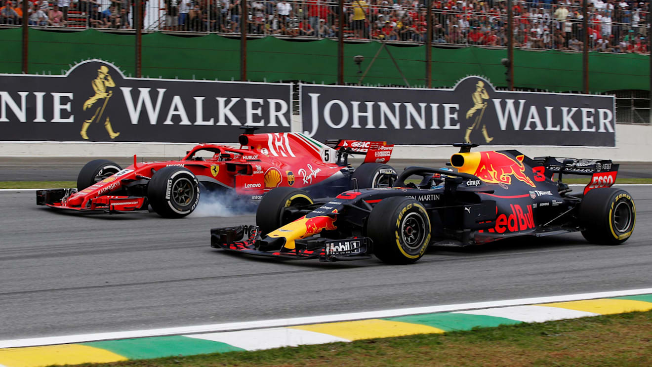 Daniel Ricciardo, Red Bull Racing RB14 and Sebastian Vettel, Ferrari SF71H battle at Formula One World Championship, Rd20, Brazilian Grand Prix, Race, Interlagos, Sao Paulo, Brazil, Sunday 11 November 2018.