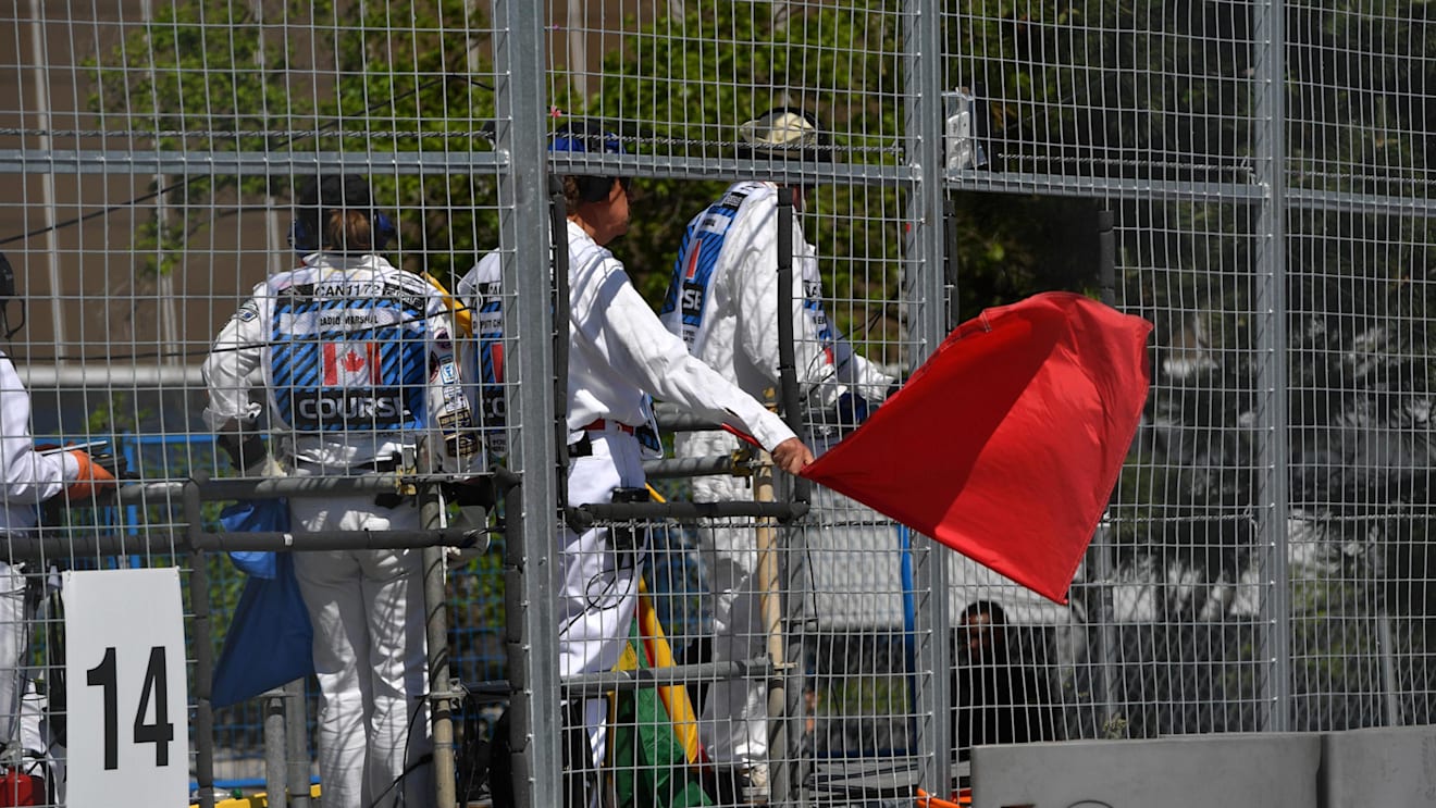 Marshals wave the red flag in FP1 at Formula One World Championship, Rd7, Canadian Grand Prix, Practice, Montreal, Canada, Friday 8 June 2018. © Mark Sutton/Sutton Images