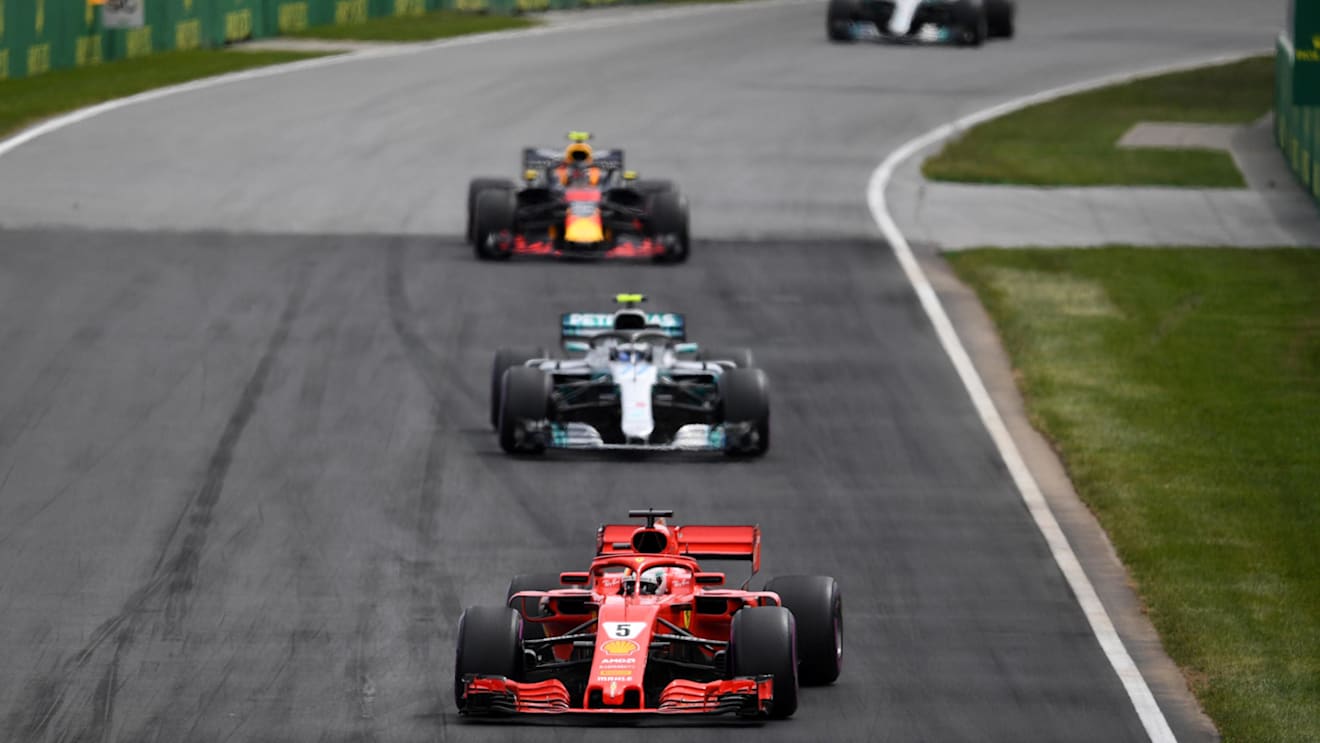Sebastian Vettel (GER) Ferrari SF-71H leads Valtteri Bottas (FIN) Mercedes-AMG F1 W09 EQ Power+ at Formula One World Championship, Rd7, Canadian Grand Prix, Race, Montreal, Canada, Sunday10 June 2018. © Simon Galloway/Sutton Images