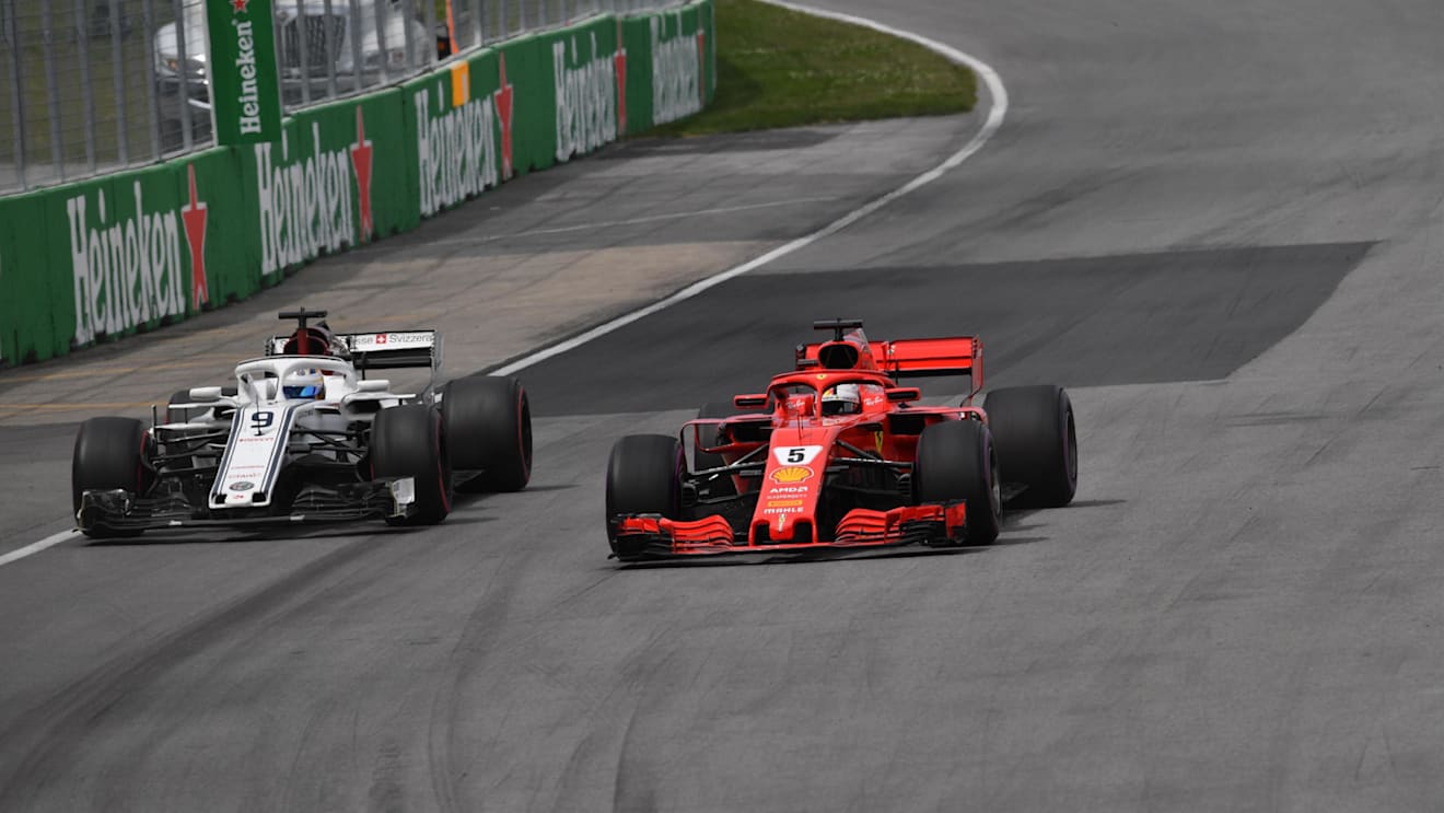 Sebastian Vettel (GER) Ferrari SF-71H and Marcus Ericsson (SWE) Alfa Romeo Sauber C37 at Formula One World Championship, Rd7, Canadian Grand Prix, Race, Montreal, Canada, Sunday10 June 2018. © Jerry Andre/Sutton Images