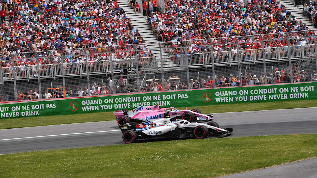 Sergey Sirotkin (RUS) Williams FW41 and Esteban Ocon (FRA) Force India VJM11 at Formula One World Championship, Rd7, Canadian Grand Prix, Race, Montreal, Canada, Sunday10 June 2018. © Jerry Andre/Sutton Images