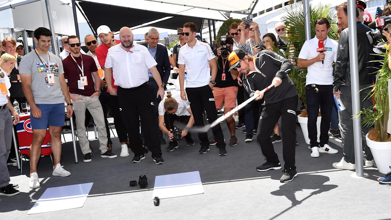 Fernando Alonso (ESP) McLaren plays hockey at Formula One World Championship, Rd7, Canadian Grand Prix, Race, Montreal, Canada, Sunday10 June 2018. © Jerry Andre/Sutton Images