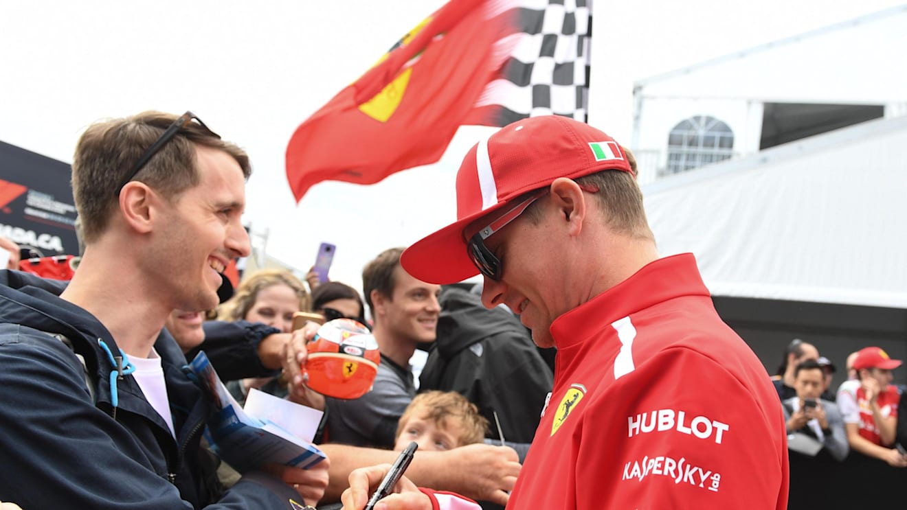 Kimi Raikkonen (FIN) Ferrari signs autographs for the fans at Formula One World Championship, Rd7, Canadian Grand Prix, Preparations, Montreal, Canada, Thursday 7 June 2018. © Simon Galloway/Sutton Images
