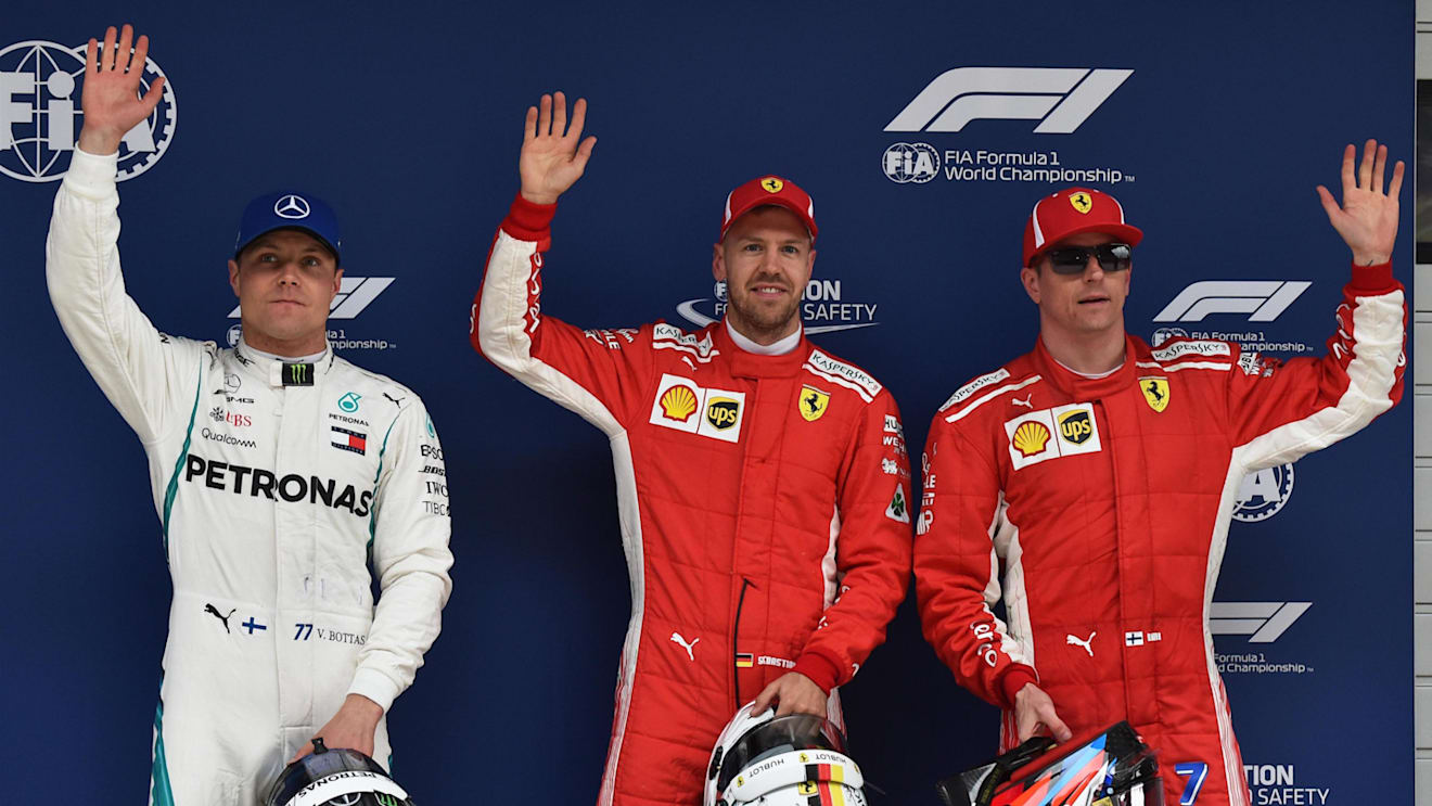 (L to R): Valtteri Bottas (FIN), pole sitter Sebastian Vettel (GER) and Kimi Raikkonen (FIN) celebrate in parc ferme at F1 World Championship, Rd3, Chinese Grand Prix, Qualifying, Shanghai, China, Saturday 14 April 2018. © Simon Galloway/Sutton Images