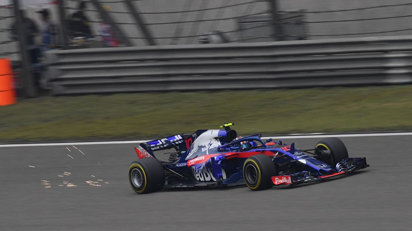 Pierre Gasly (FRA) Scuderia Toro Rosso STR13 sparks at Formula One World Championship, Rd3, Chinese Grand Prix, Qualifying, Shanghai, China, Saturday 14 April 2018. © Jerry Andre/Sutton Images