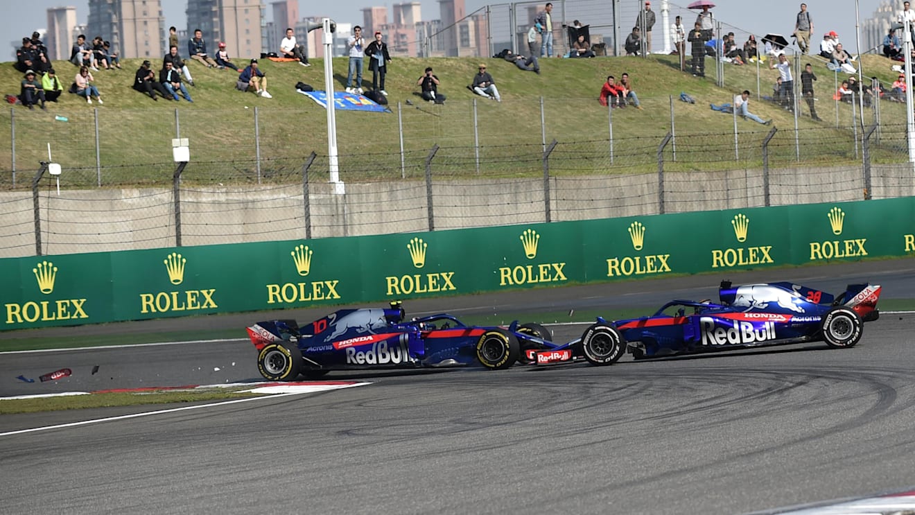 Pierre Gasly (FRA) Scuderia Toro Rosso STR13 and Brendon Hartley (NZL) Scuderia Toro Rosso STR13 collide at Formula One World Championship, Rd3, Chinese Grand Prix, Race, Shanghai, China, Sunday 15 April 2018. © Simon Galloway/Sutton Images