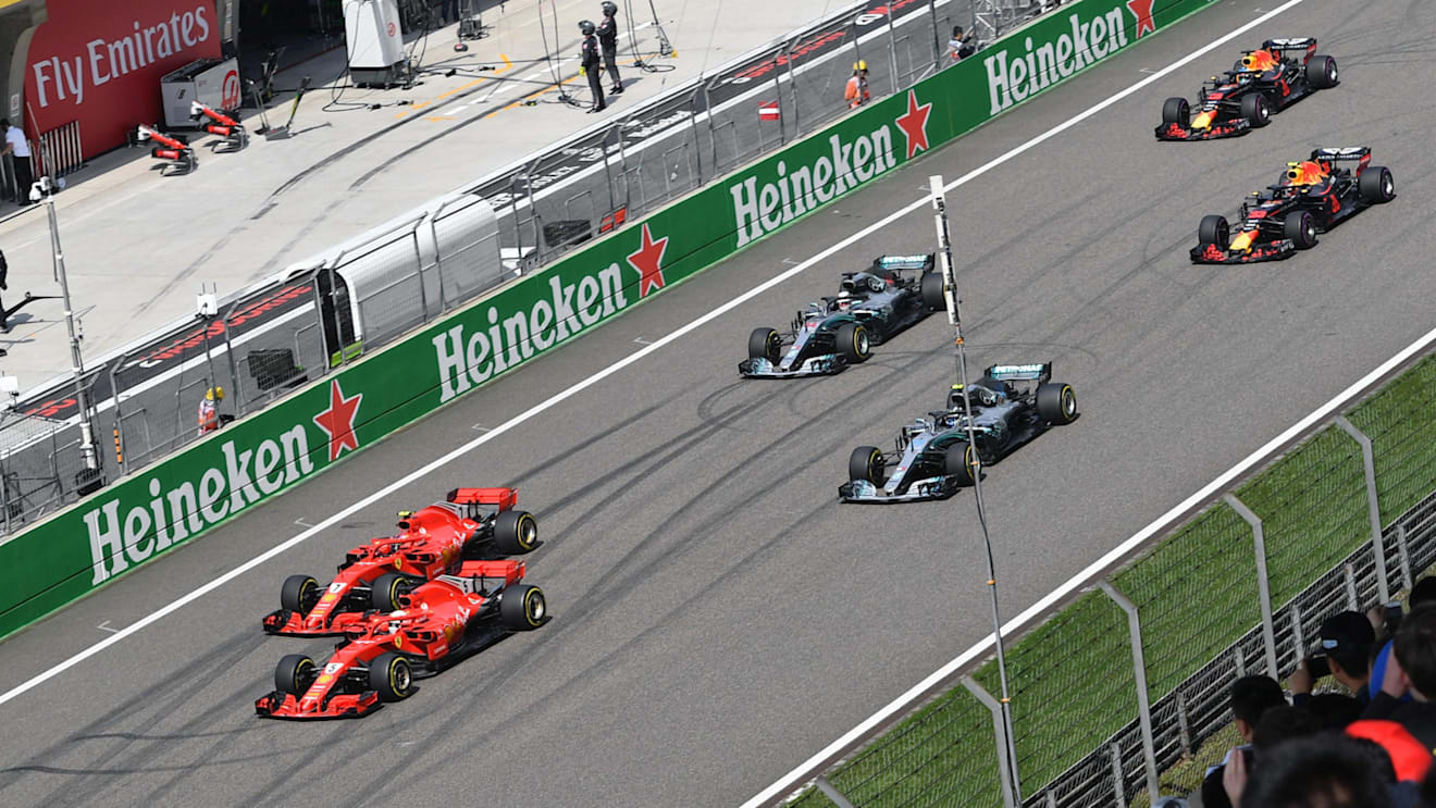 Sebastian Vettel (GER) Ferrari SF-71H and Kimi Raikkonen (FIN) Ferrari SF-71H lead at the start of the race at Formula One World Championship, Rd3, Chinese Grand Prix, Race, Shanghai, China, Sunday 15 April 2018. © Jerry Andre/Sutton Images