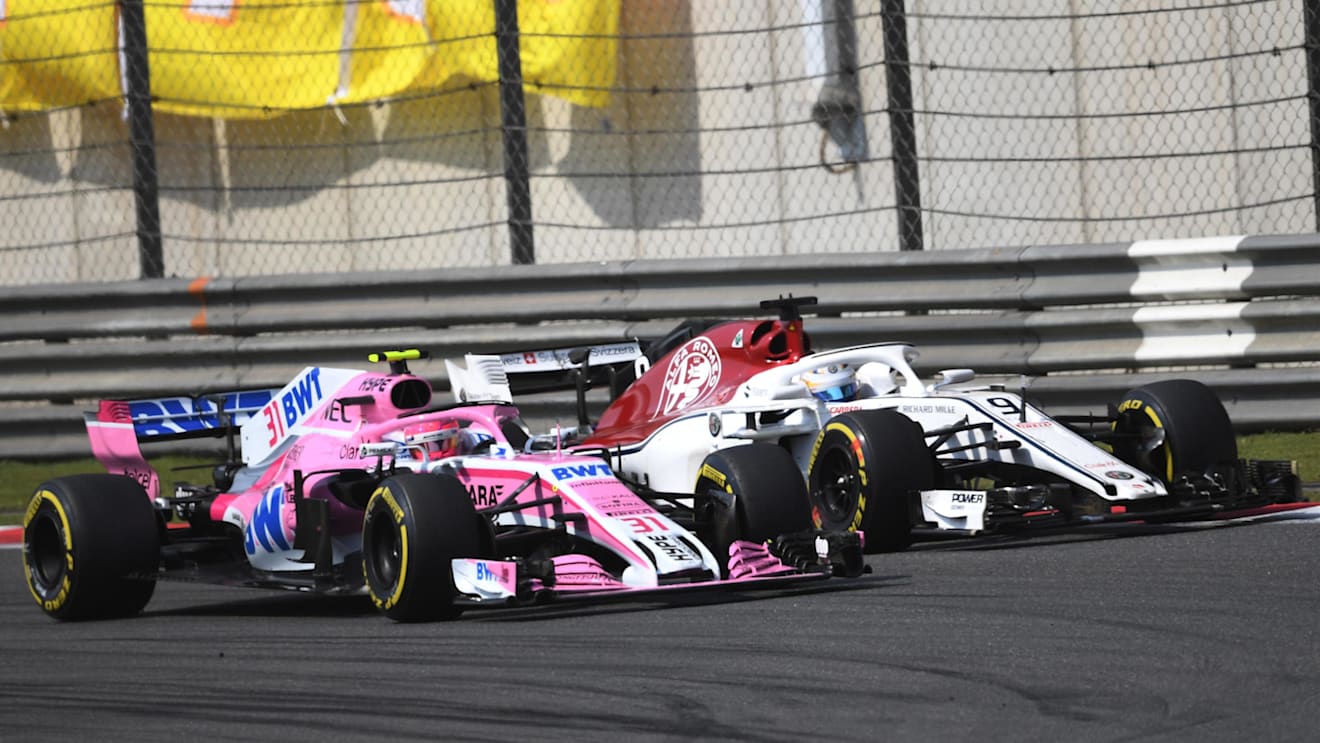 Marcus Ericsson (SWE) Alfa Romeo Sauber C37 and Esteban Ocon (FRA) Force India VJM11 battle at Formula One World Championship, Rd3, Chinese Grand Prix, Race, Shanghai, China, Sunday 15 April 2018. © Simon Galloway/Sutton Images