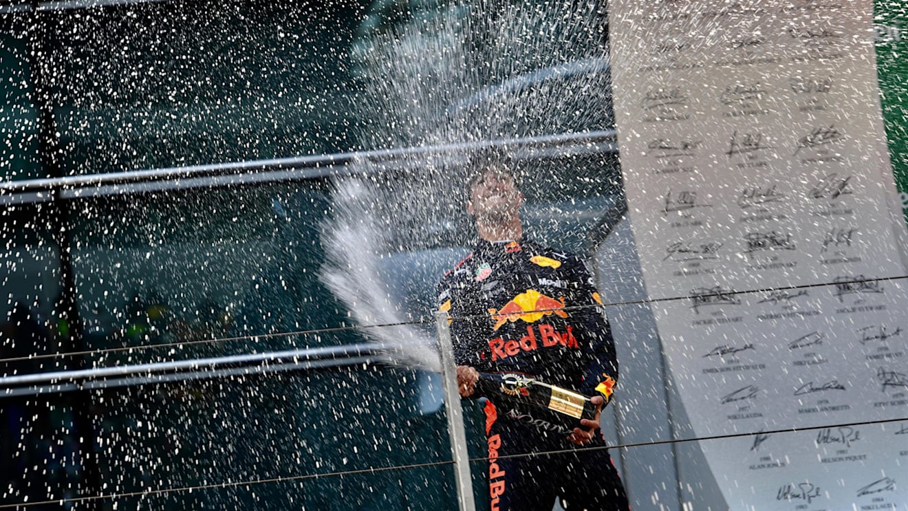 Race winner Daniel Ricciardo (AUS) Red Bull Racing celebrates on the podium with the champagne at Formula One World Championship, Rd3, Chinese Grand Prix, Race, Shanghai, China, Sunday 15 April 2018. © Jerry Andre/Sutton Images